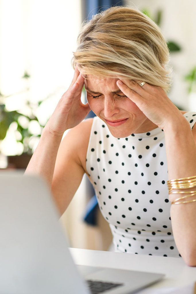 woman frustrated at computer 404 page